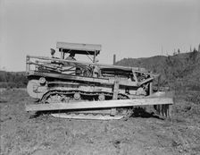 Caterpillar clearing land on cut...western Washington farm, Lewis County, Western Washington, 1939. Creator: Dorothea Lange