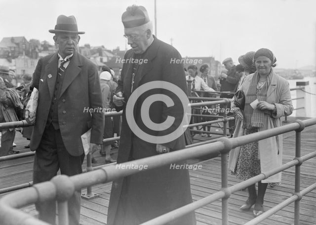 Catholic priest, c1935. Creator: Kirk & Sons of Cowes.