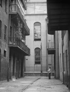 Cathedral Alley, New Orleans, between 1920 and 1926. Creator: Arnold Genthe