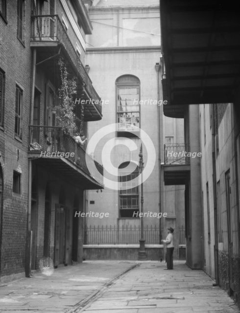 Cathedral Alley, New Orleans, between 1920 and 1926. Creator: Arnold Genthe.