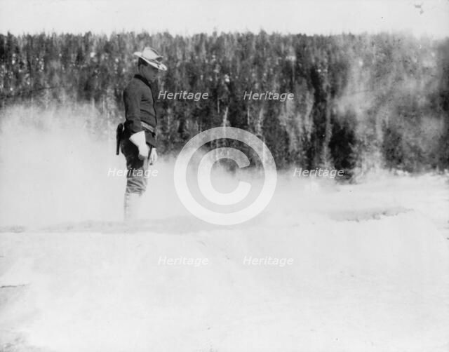 Cavalryman guard at Midway geyser basin, Yellowstone National Park, 1903. Creator: Frances Benjamin Johnston.