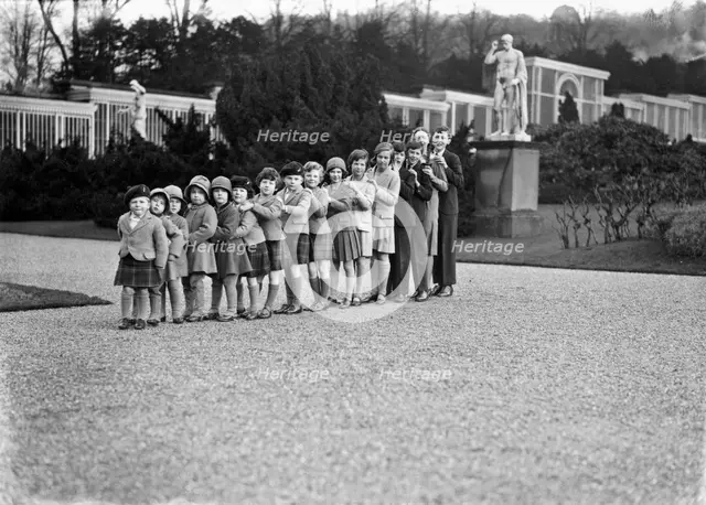 Cavendish family group of 16 grandchildren in the gardens of Chatsworth, Derbyshire, 1930. Creator: JR Board.