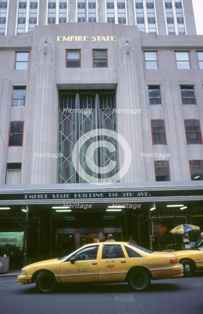 Cab outside Empire State Building New York. Artist: Unknown.
