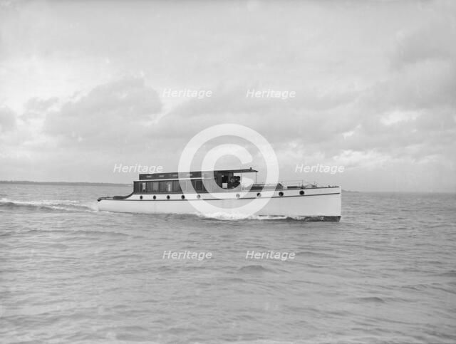 Cabin cruiser D.G.S.P., 1913. Creator: Kirk & Sons of Cowes.