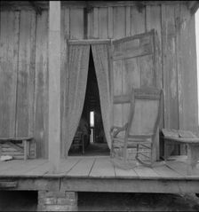 Cabin on sugar plantation, Bayou La Fourche, Louisiana, 1937. Creator: Dorothea Lange