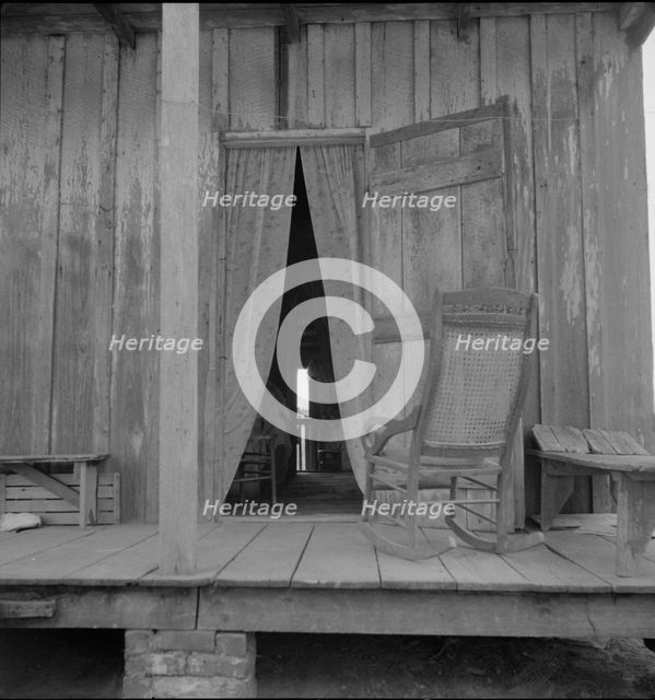 Cabin on sugar plantation, Bayou La Fourche, Louisiana, 1937. Creator: Dorothea Lange.