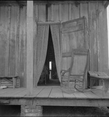 Cabin on sugar plantation, Bayou La Fourche, Louisiana, 1937. Creator: Dorothea Lange