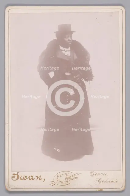 Cabinet card of an unidentified woman wearing a top hat and a fur stole, ca. 1895. Creator: Justus C. Swan.