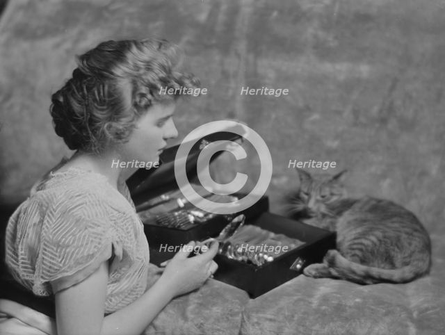 Cadmus, Miss, with Buzzer the cat, portrait photograph, 1914 Apr. 24. Creator: Arnold Genthe.