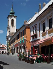Café and church, Szentendre, Hungary. Creator: Peter Thompson
