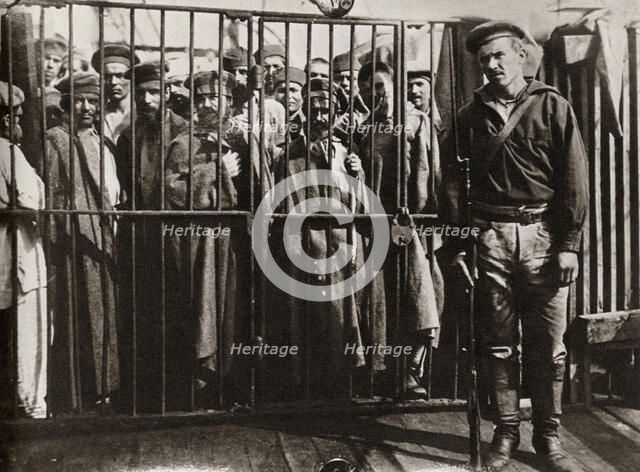Caged prisoners cage on the steamer 'Petersburg' on the way to Sakhalin, Russia, 1890. Artist: Anton Chekhov