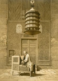 Cairo: Funerary or Sepuchral Mosque of Sultan Barquoq seated Imam reading the Koran, before a pierce Creator: Emile Prisse d'Avennes (1807-79)