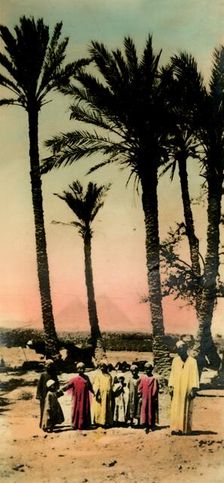 Cairo: Native children near the Pyramids c1918-c1939. Creator: Unknown