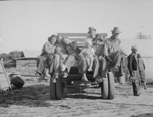 California pea pickers returning to camp..., near Santa Clara, California, 1937. Creator: Dorothea Lange