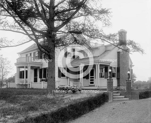 Calloway residence, back & side with tree & flower bed, Mamaroneck, N.Y., between 1900 and 1915. Creator: William H. Jackson.