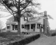 Calloway residence, back & side with tree & flower bed, Mamaroneck, N.Y., between 1900 and 1915. Creator: William H. Jackson