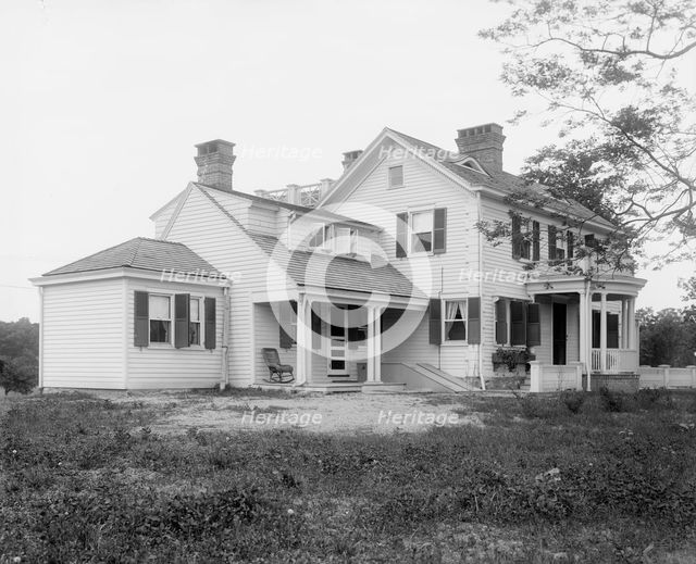 Calloway residence, back porch, with chair, Mamaroneck, N.Y., between 1900 and 1915. Creator: William H. Jackson.