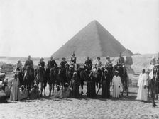 Camel tour in front of one of the Pyramids of Giza, Egypt, c1920s-c1930s(?)
