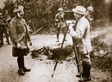 Cameraman filming a wounded soldier, Somme campaign, France, World War I, 1916. Creator: Unknown