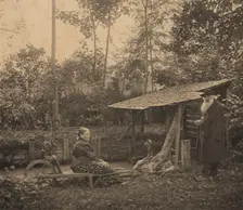 Camille Pissarro and Julie at the washhouse, Eragny, c1884-1903. Creator: Unknown