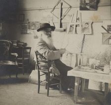 Camille Pissarro painting in his studio, c1860-1903. Creator: Unknown