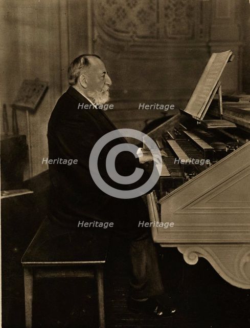 Camille Saint-Saëns (1835-1921) at the Organ, 1913. Creator: Anonymous.