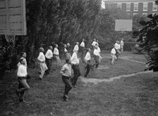 Camp, Walter, I.E, Exercise School - Cabinet Officials Exercising with Other Govt..., 1917 or 1918. Creator: Harris & Ewing