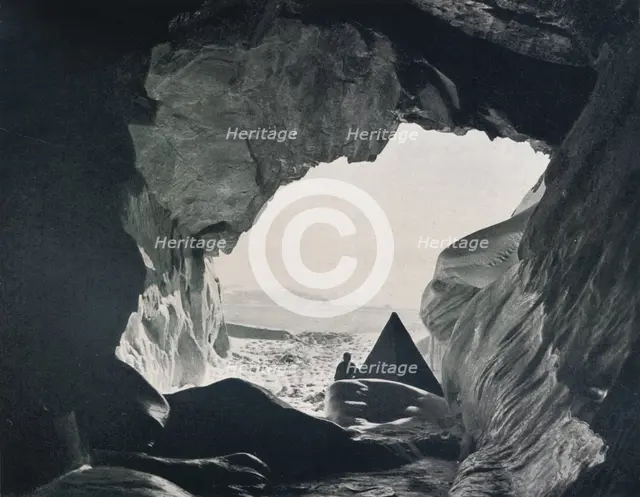 'Camp in the Cave Under Penelope Point', 1912, (1913). Artist: G Murray Levick.