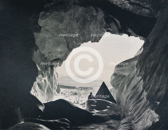 'Camp in the Cave Under Penelope Point', 1912, (1913). Artist: G Murray Levick.