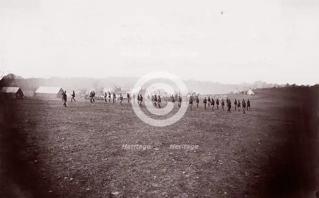 Camp of 34th Massachusetts Infantry, Miner's Hill, VA. Skirmish Drill., 1862-63. Creator: Unknown.