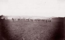 Camp of 34th Massachusetts Infantry, Miner's Hill, VA. Skirmish Drill., 1862-63. Creator: Unknown