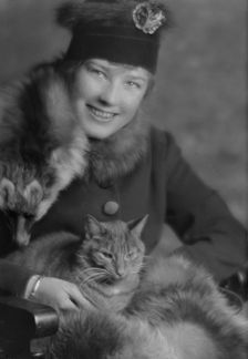 Campbell, Natalie, Miss, with Buzzer the cat, portrait photograph, 1914 Dec. 24. Creator: Arnold Genthe