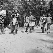 Campers returning from a day's hike at Camp Fern Rock, Bear Mountain, New York, 1943 Creator: Gordon Parks