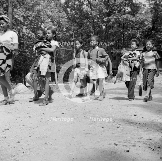 Campers returning from a day's hike at Camp Fern Rock, Bear Mountain, New York, 1943 Creator: Gordon Parks.