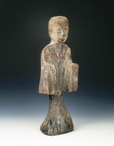 Camphor wood standing female figure, China, c206 BC-c8 AD