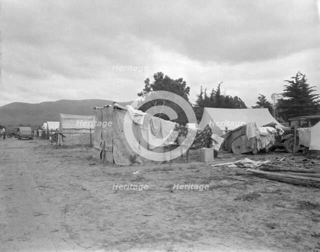 Camps of migrant pea workers, California, 1936. Creator: Dorothea Lange.