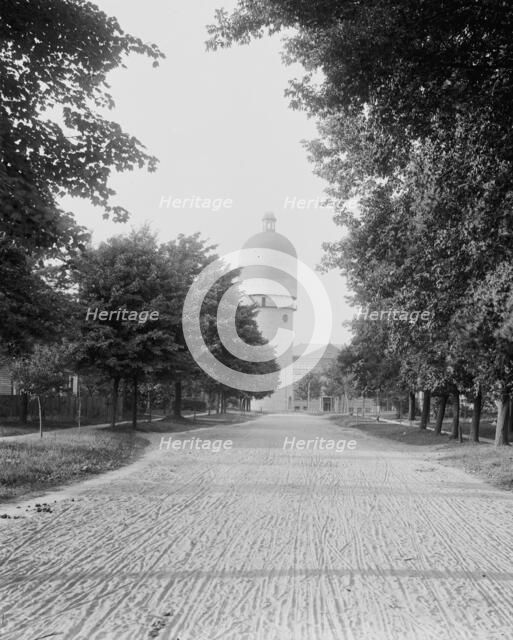 Campus road leading to stone tower, Michigan State Normal College, Ypsilanti, Mich., c1900-1910. Creator: Unknown.