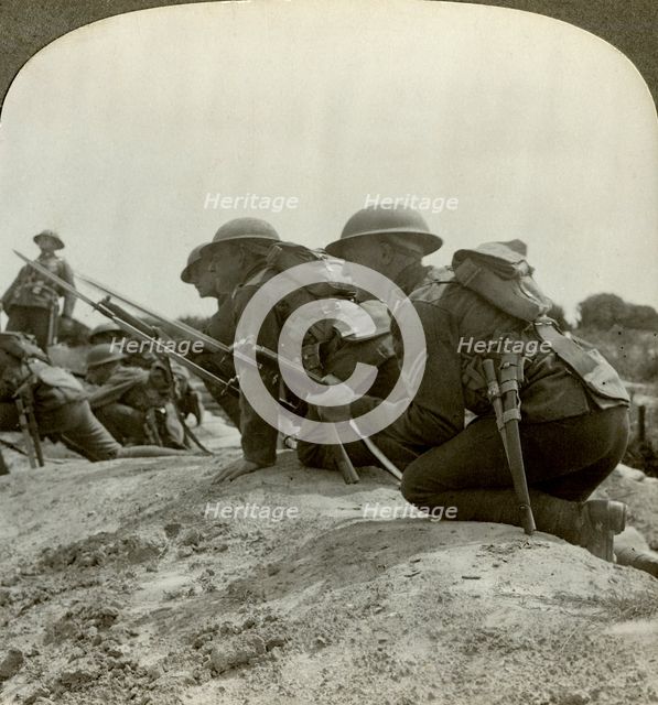 Canadian infantry rush a German position, World War I, 1914-1918.Artist: Realistic Travels Publishers