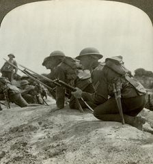 Canadian infantry rush a German position, World War I, 1914-1918.Artist: Realistic Travels Publishers