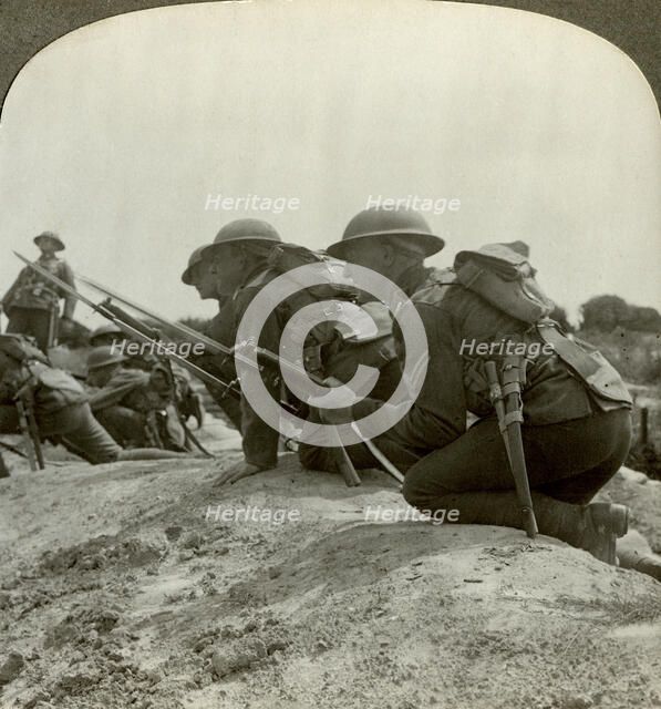 Canadian infantry rush a German position, World War I, 1914-1918.Artist: Realistic Travels Publishers