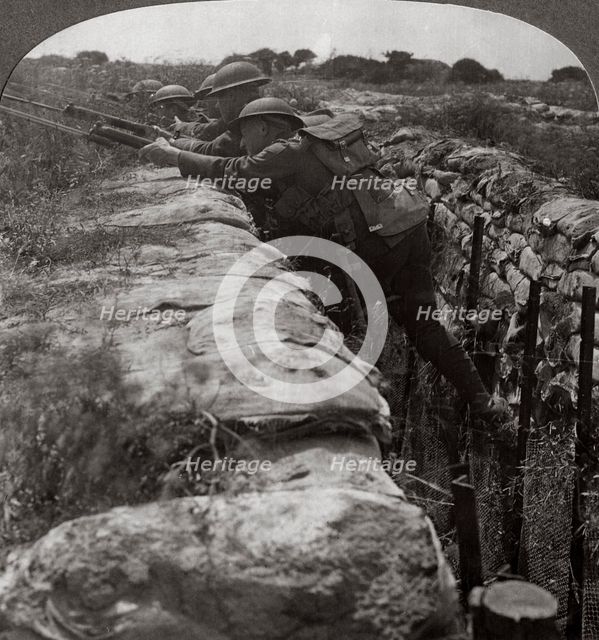 Canadians leaving their trenches to rush a German position, World War I, 1914-1918.Artist: Realistic Travels Publishers