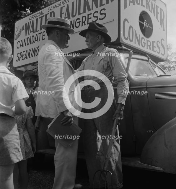 Candidate for congress (General Walter Faulkner) and a Tennessee farmer, Crossville, Tennessee, 1938 Creator: Dorothea Lange.