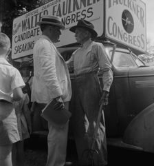 Candidate for congress (General Walter Faulkner) and a Tennessee farmer, Crossville, Tennessee, 1938 Creator: Dorothea Lange
