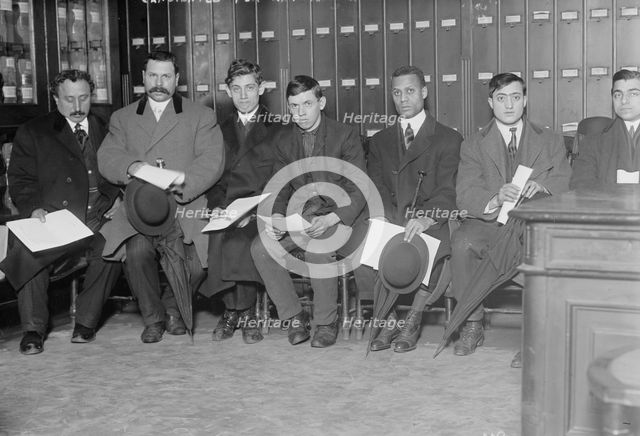 Candidates for naturalization seated with papers, 1910. Creator: Bain News Service.