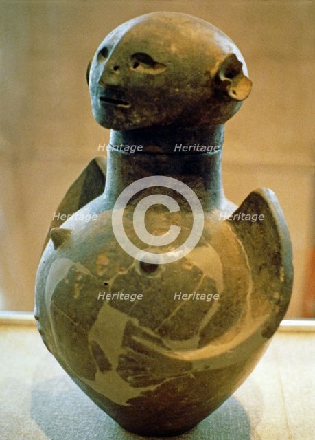 Canope glass depicting a female figure.