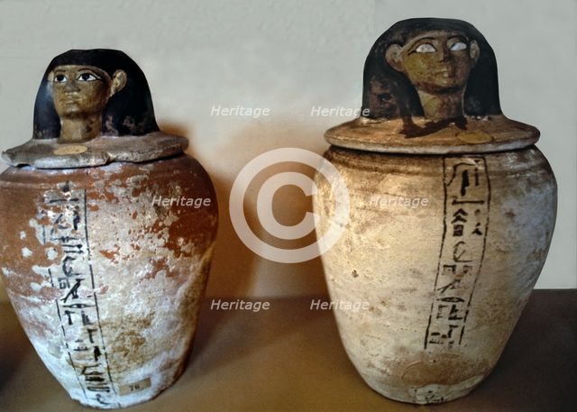 Canopic vase in clay.