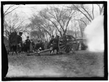 Cannon Firing, between 1909 and 1914. Creator: Harris & Ewing