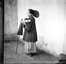Canton, Kwangtung province, China: a lady holding a parasol, 1869. Creator: John Thomson