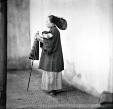 Canton, Kwangtung province, China: a lady holding a parasol, 1869. Creator: John Thomson