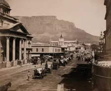 Cape Town, South Africa: horses and carriages on Adderley Street, with Table Mountain..., 1896. Creator: George Washington Wilson